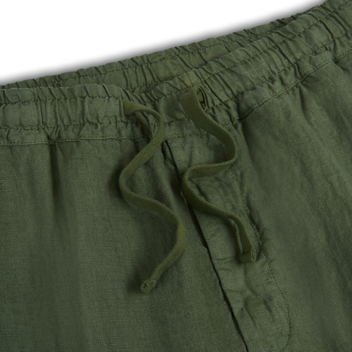 Close-up of Altea’s Army Green Linen Drawstring Trouser with an elastic waistband, two matching drawstrings, visible stitching, textured linen fabric, and a partial right side pocket shown against a white background. , available at Richard Gelding Mayfair