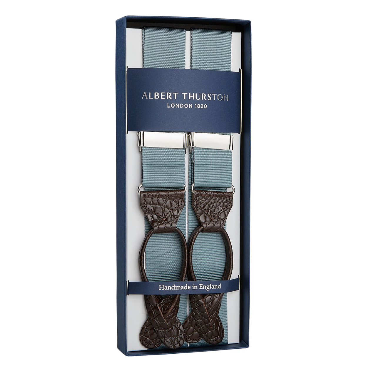 A pair of Albert Thurston Dove Grey James Bond Nylon 35mm braces with blue straps and brown leather detailing, presented in an elegant box labeled "Handmade in England".