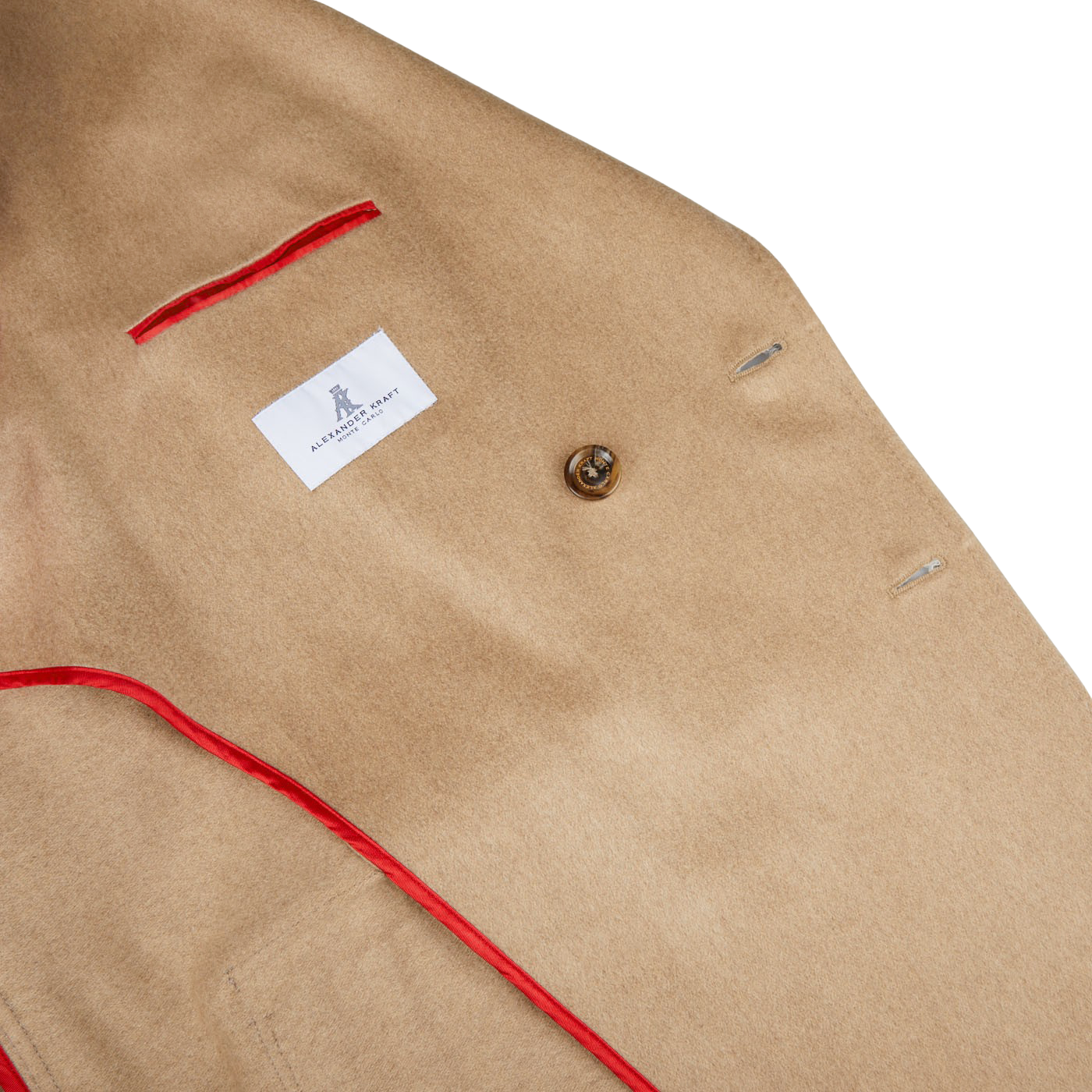 An Alexander Kraft Monte Carlo Camel Beige Pure Cashmere Florence DB Overcoat with a red lining.