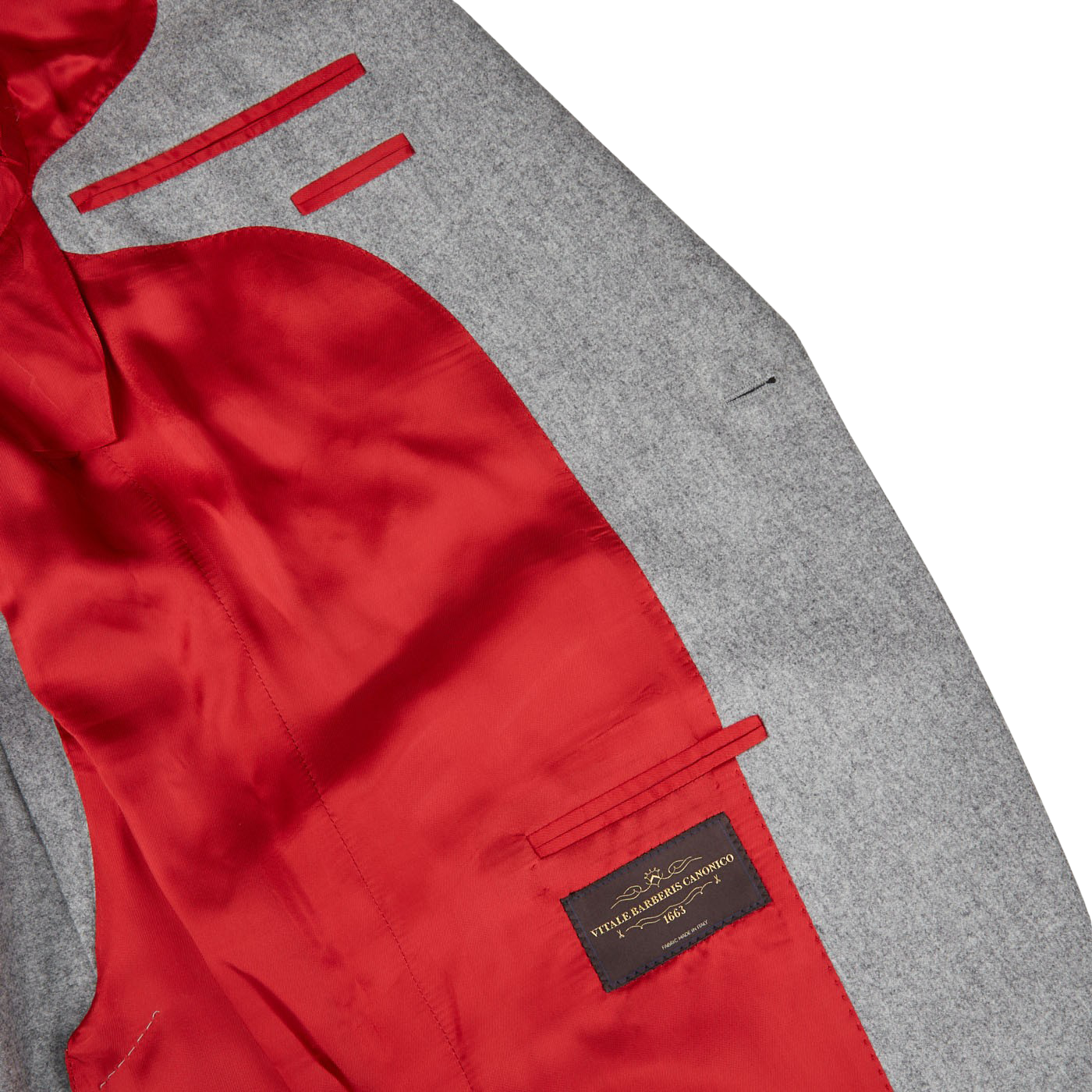 The back of a Light Grey VBC Wool Flannel Signature Jacket made in Italy, crafted from pure wool flannel, Alexander Kraft Monte Carlo.