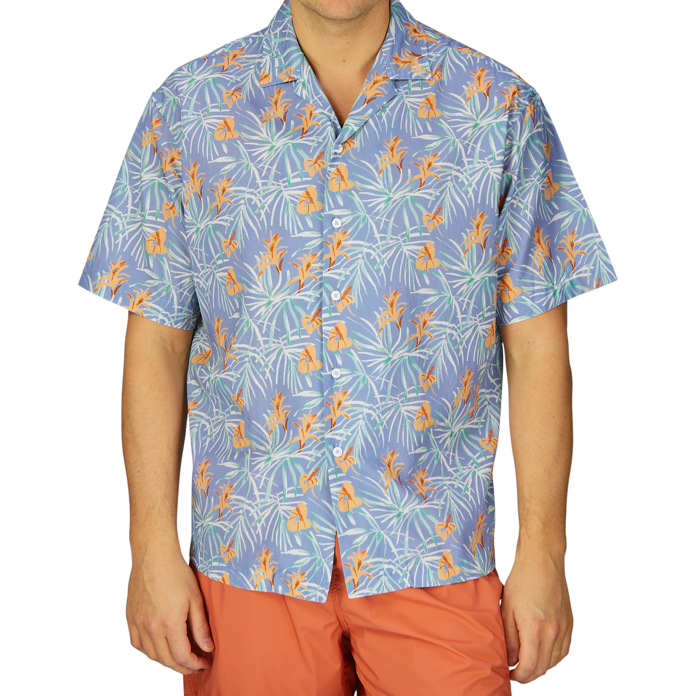 A person wearing a Light Blue Floral Printed Cotton Shirt by Altea and orange pants, a summer essential outfit.