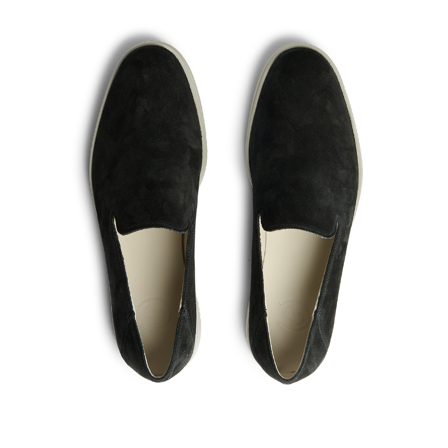 A pair of Black Suede Leather Vice Loafers by CQP perfect for summer displayed on a black background.