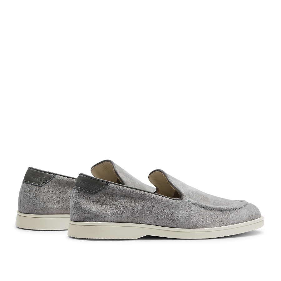 A pair of comfortable Cement Grey Suede Leather Debonair Loafers slip-on shoes with white soles by CQP on a transparent background.