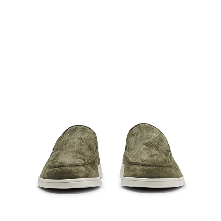 A designer pair of Juniper Green Suede Leather Debonair Slippers with white soles by CQP.