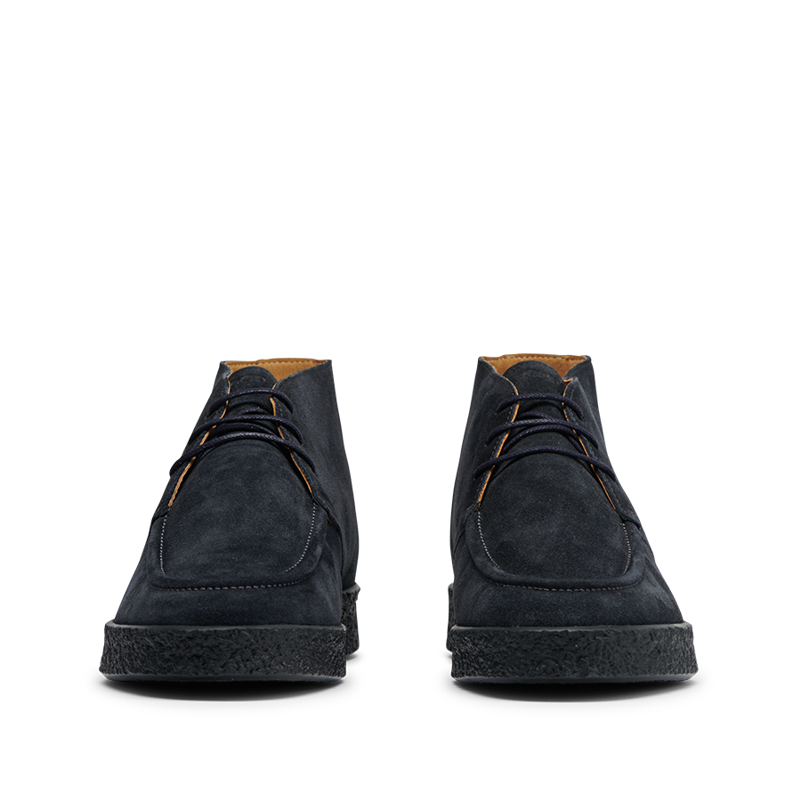 Front view of the CQP Navy Blue Suede Leather Plana Boots featuring black laces and crepe rubber soles.