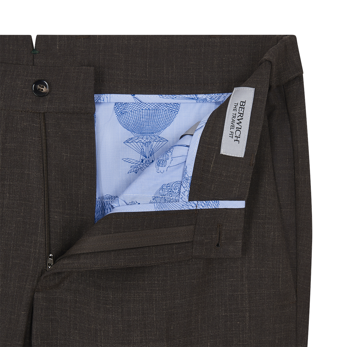 Close-up of the waistband and fly of the Berwich Brown Wool Silk Linen Loro Piana Casual Trouser, partly opened to show light blue pocket lining with intricate sketches and a BERWICH THE FINAL CUT fabric label inside. , available at Richard Gelding Mayfair