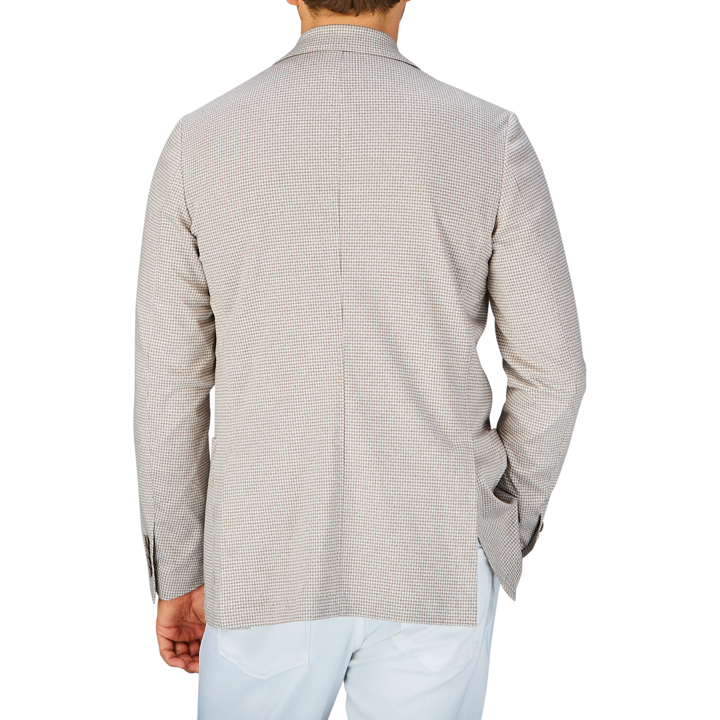 Rear view of a person wearing a Canali Beige Houndstooth Cotton Jersey Blazer with the collar turned up.