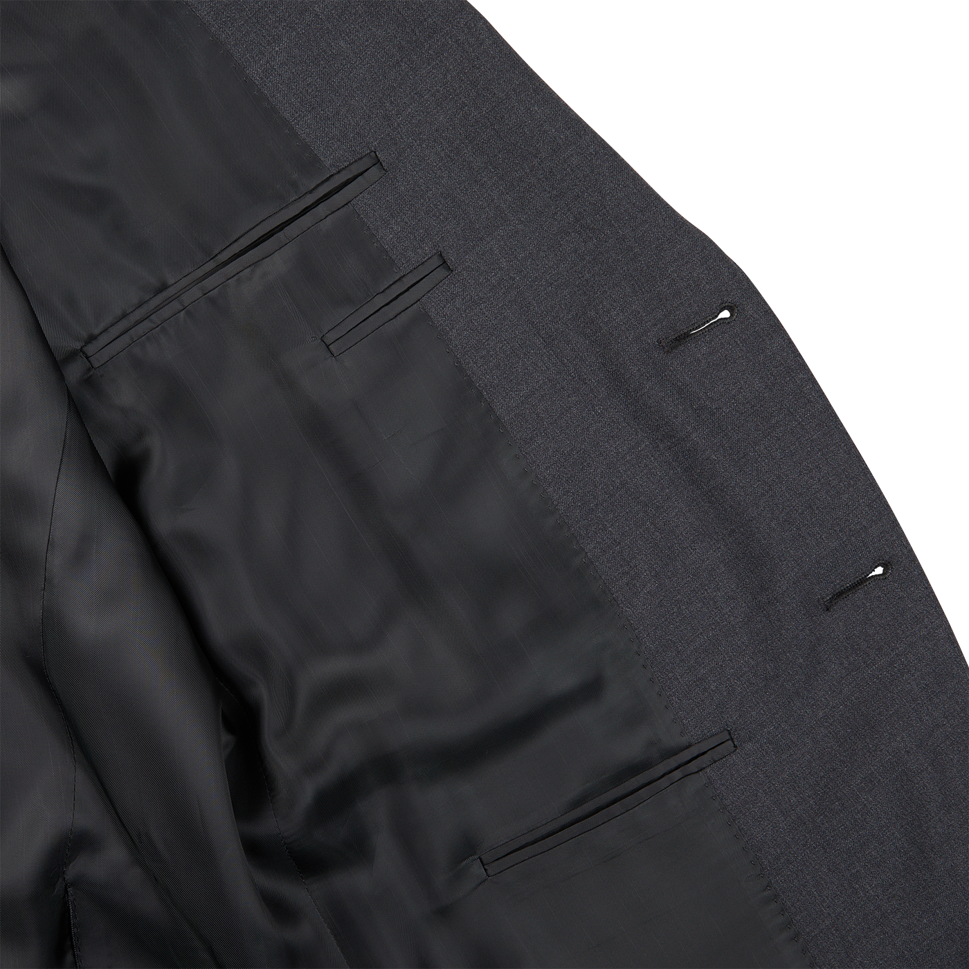 A close up of a Canali Charcoal Grey Wool Notch Lapel Suit with black buttons.