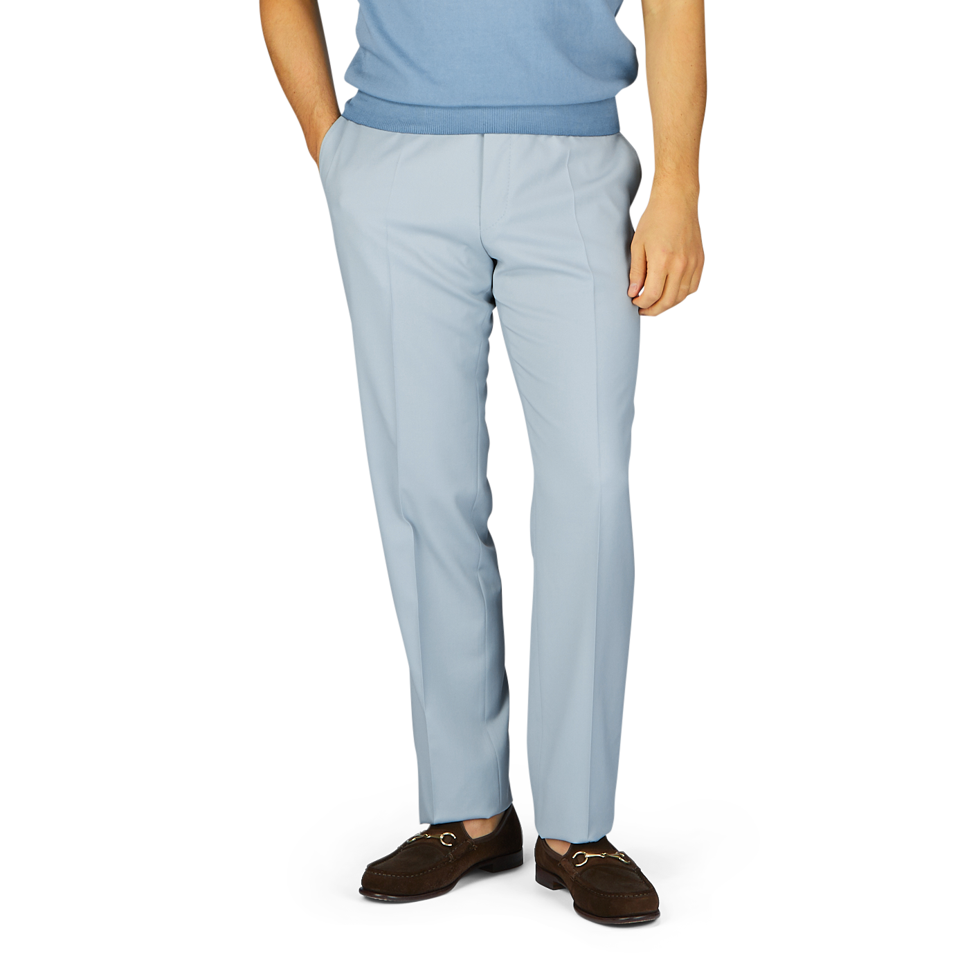 Person wearing Canali Dove Grey Flat Front Wool Twill Trousers and brown shoes standing with hands partially in pockets.