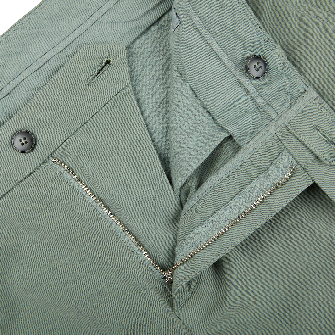 A close up of a zipper on Canali Sage Green Cotton Stretch Flat Front Chinos.