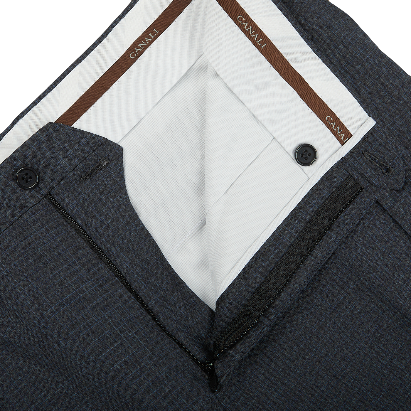 A close up of a Canali grey blue melange checked wool trousers with a brown pocket.