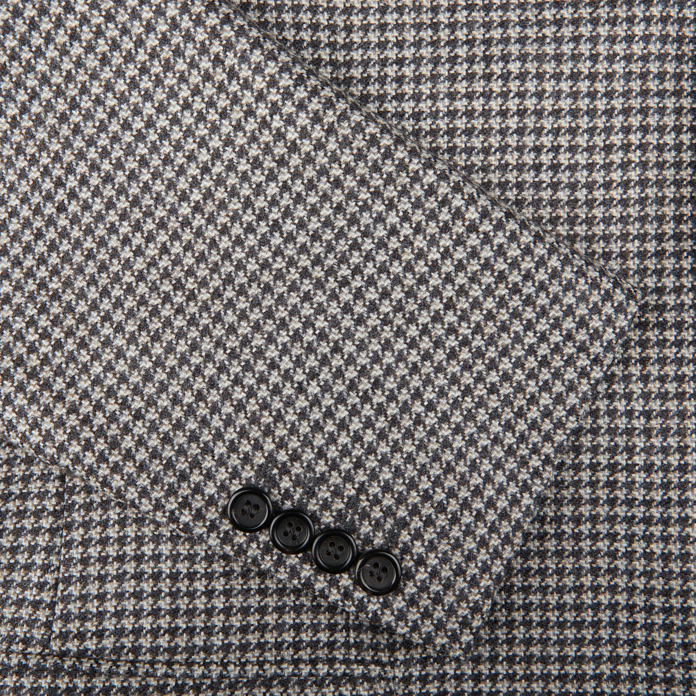 A close up of a Canali Grey Houndstooth Wool Drop 6 Blazer.