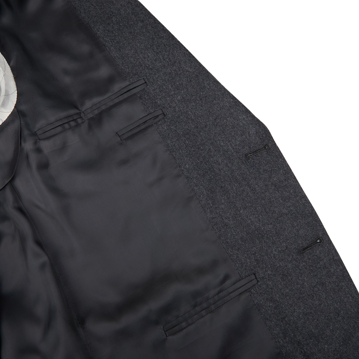 A close up of a Canali structured shoulder Grey Melange Wool Flannel Suit with a white pocket.