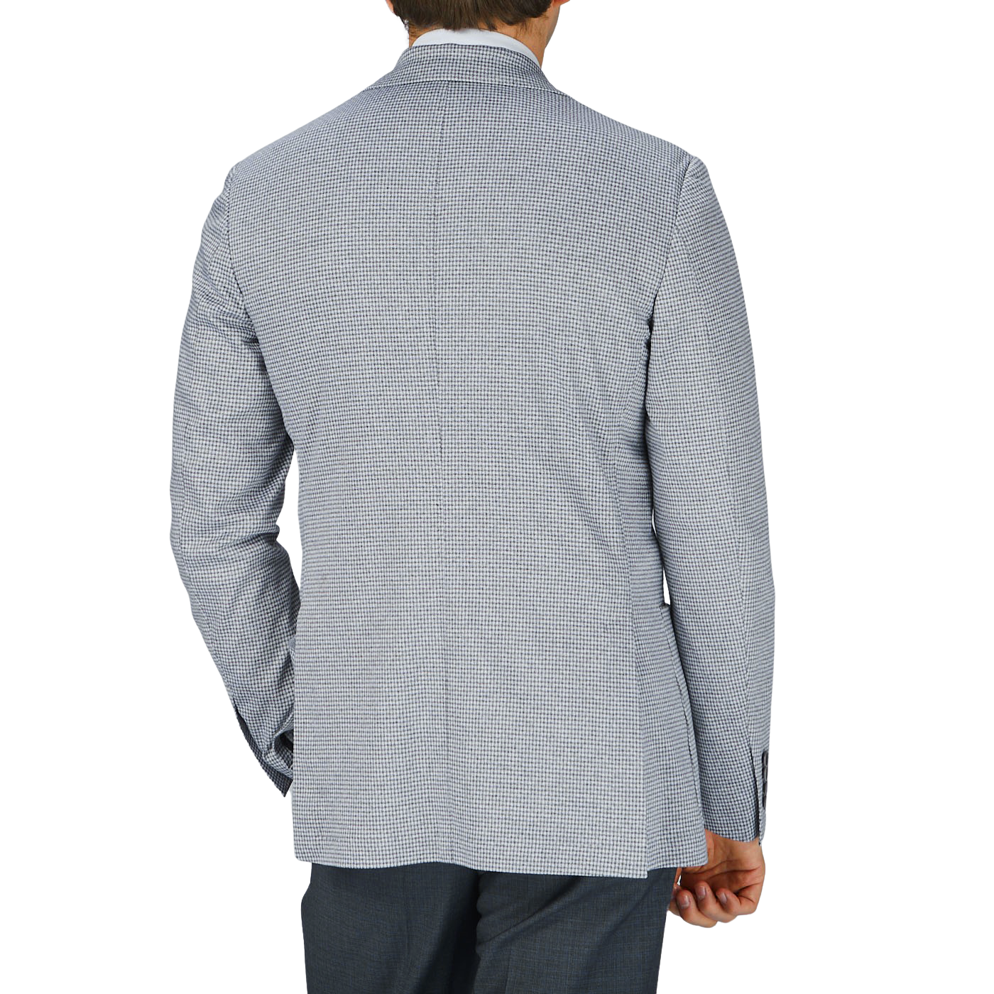 The back view of a man wearing a Canali Light Grey Houndstooth Cotton Jersey Blazer with casual tailoring.