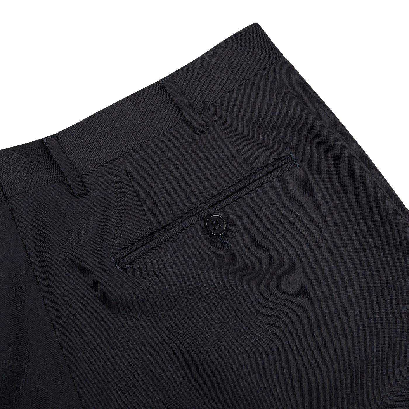 The back pocket of Canali navy blue wool twill formal trousers, made from navy blue wool twill fabric.