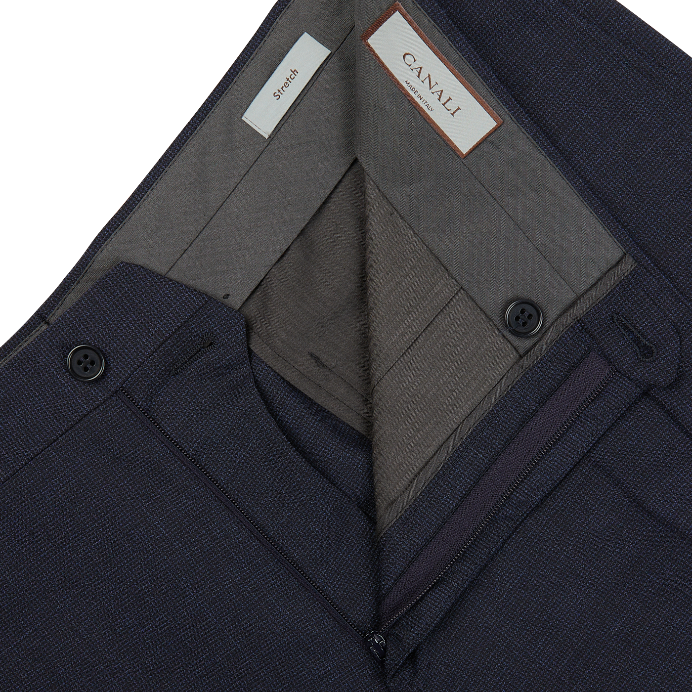 A pair of Canali Navy Puppytooth Wool Stretch Flat Front Trousers with a pocket on the side crafted from wool fabric.