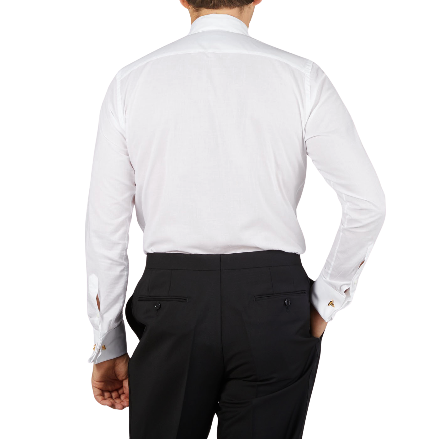 The back view of a man wearing the Canali White Cotton Double Cuff Pleated Dress Shirt.