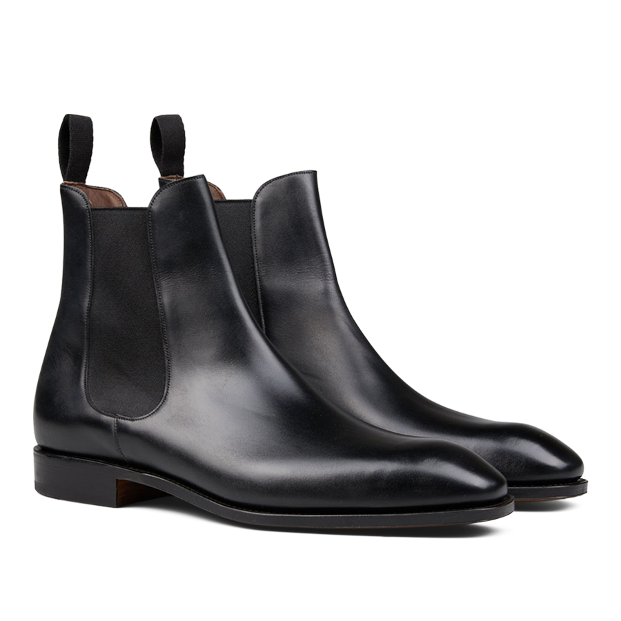 A pair of Carmina Black Calf Leather Simpson Chelsea Boots with elastic side panels, crafted by skilled craftsmen.