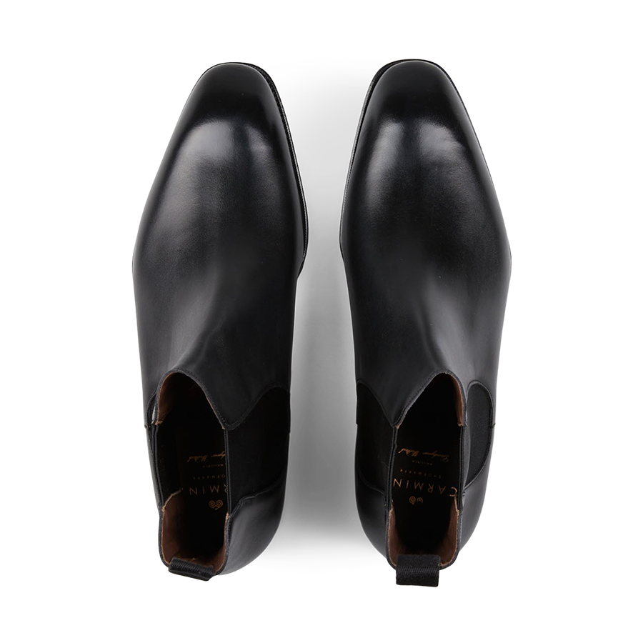 A pair of Carmina's Black Calf Leather Simpson Chelsea Boots displayed against a white background, crafted on the Simpson last.