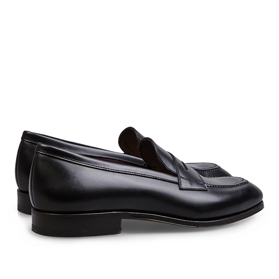 Black Calf Leather Uetam Penny Loafers by Carmina, with durable construction on a transparent background.