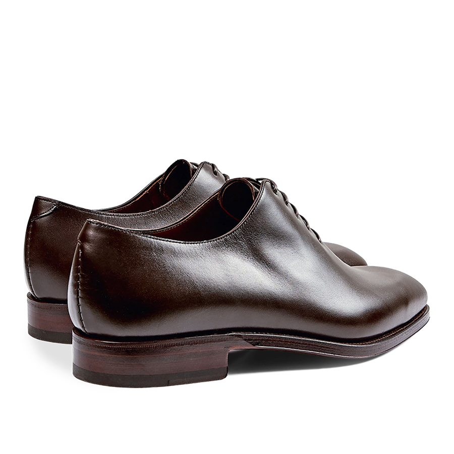 A pair of Carmina Brown Calf Leather Rain Wholecut Oxfords with laces, crafted from calf leather.