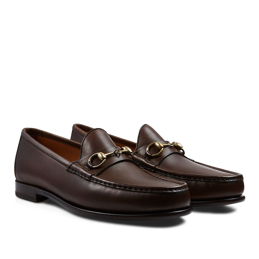 A pair of Brown Funchal Leather Xim Horsebit loafers crafted by skilled craftsmen with gold-tone metal horsebit detail by Carmina.