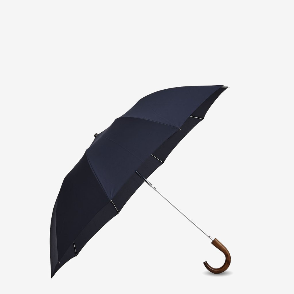 A Navy Telescopic Maple Handle Umbrella by Fox Umbrellas on a white background.