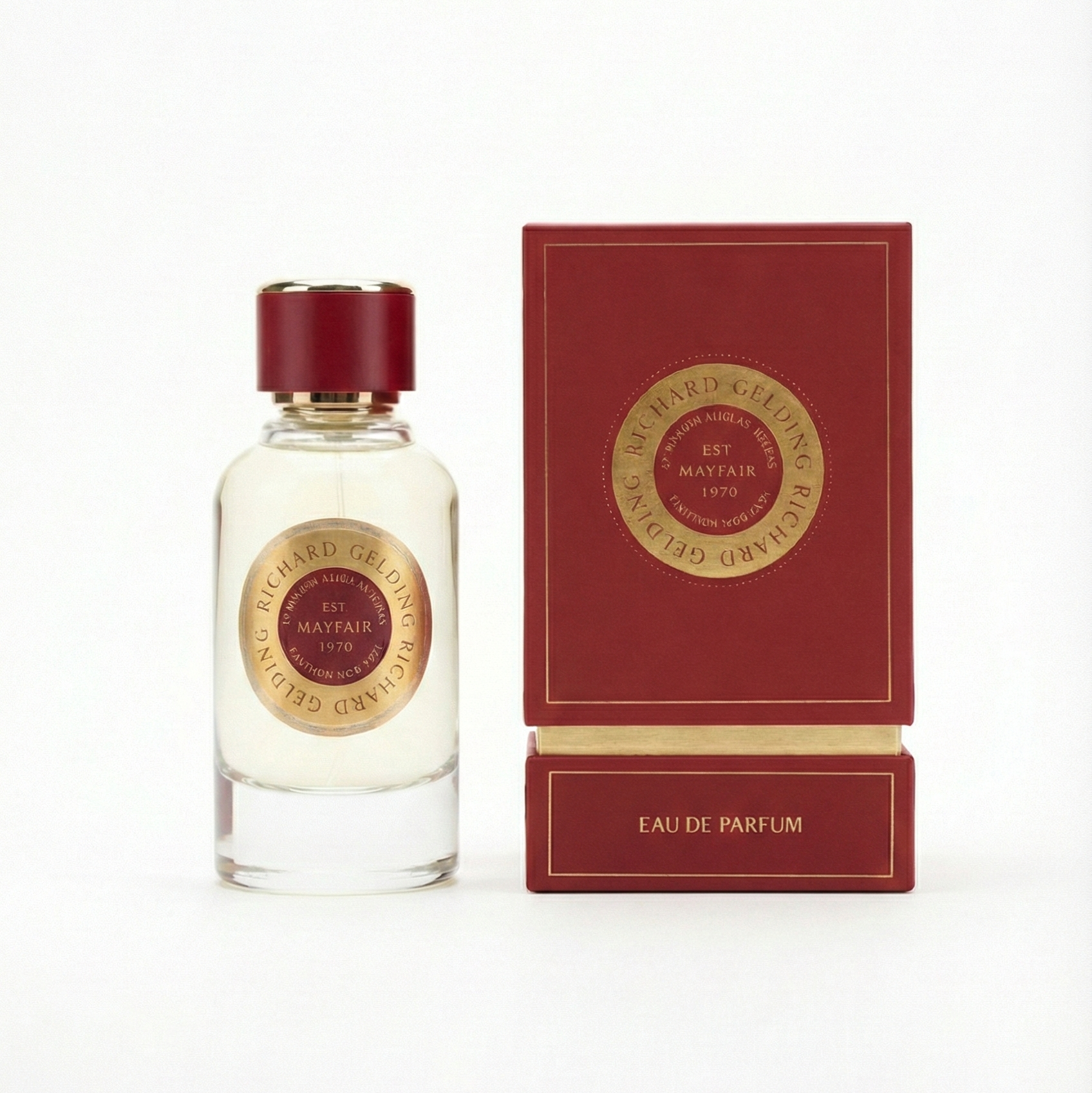 A clear glass bottle with a gold and red cap stands by a matching box, both labeled Richard Gelding Sultan EdP 100ml—a refined fragrance from Richard Gelding in elegant lettering. , available at Richard Gelding Mayfair