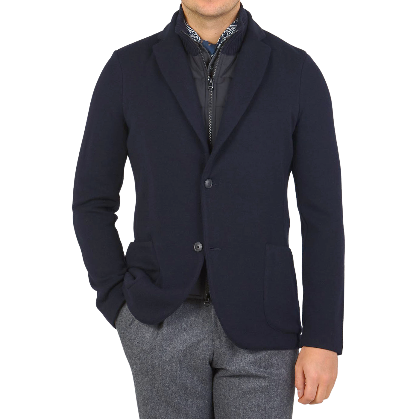 A man wearing a Navy Blue Rain Wool Knitted Jacket blazer by Gran Sasso.