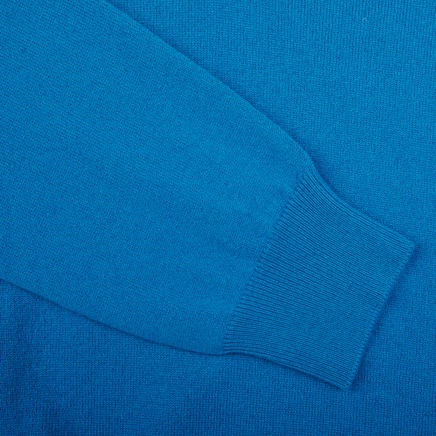 A close up of a Gran Sasso Hot Blue Cashmere 1/4 Zip Sweater.