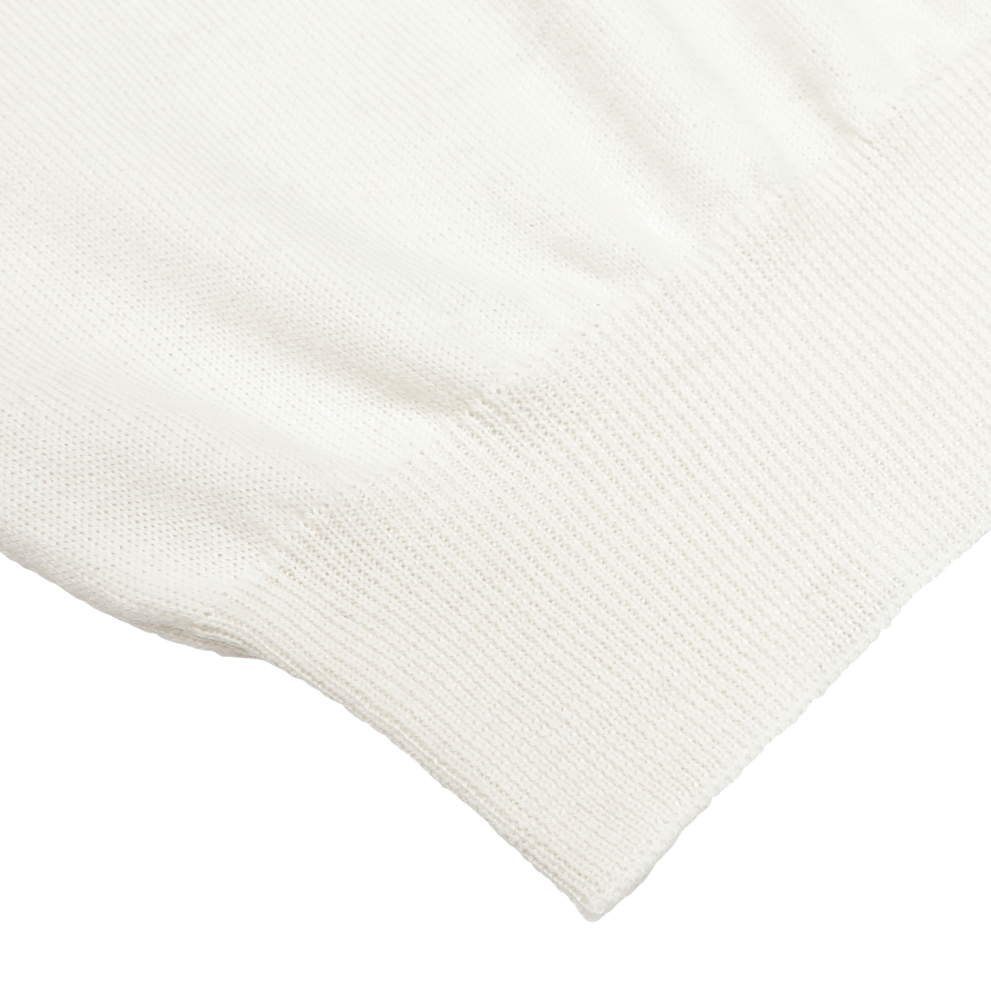 Close-up view of the hem and fabric texture of the Ivory Merino Wool One-Piece Collar Polo Shirt by Gran Sasso.