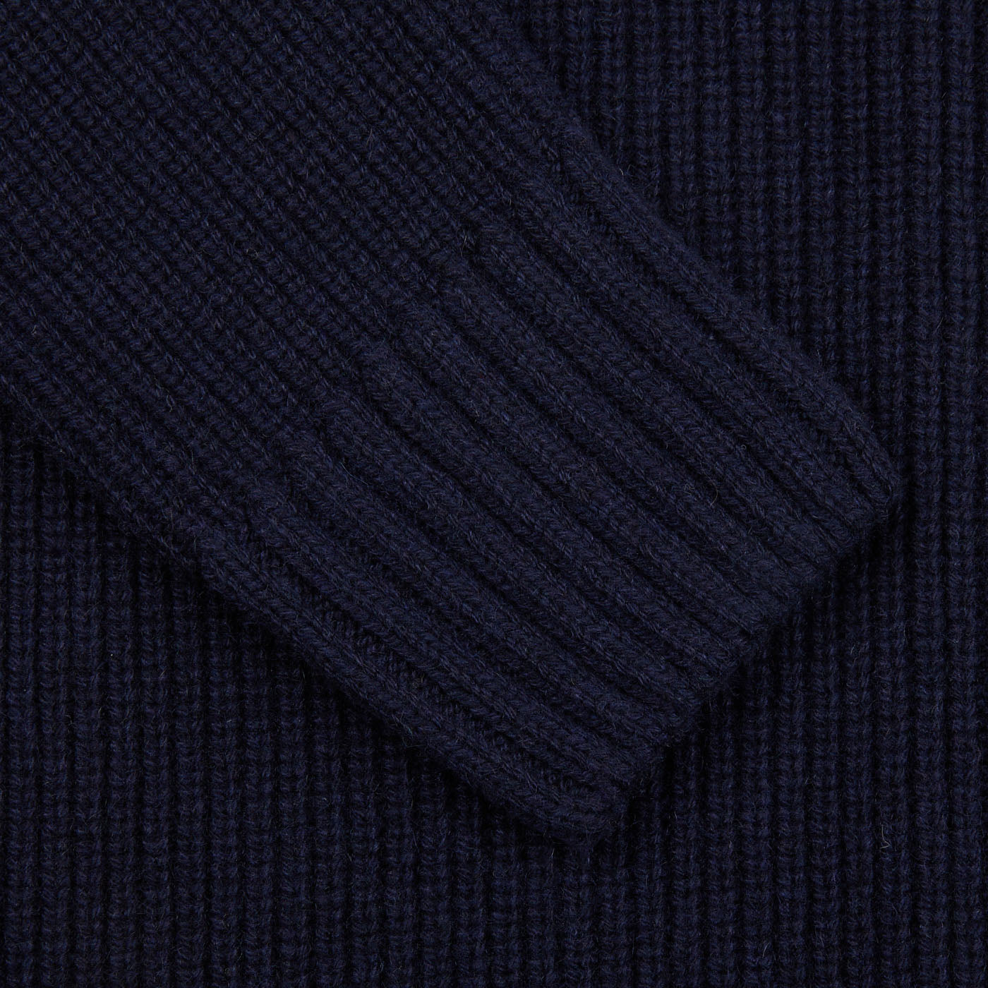 A close up of a Gran Sasso Navy Blue Eco Cashmere Funnel Neck Cardigan.