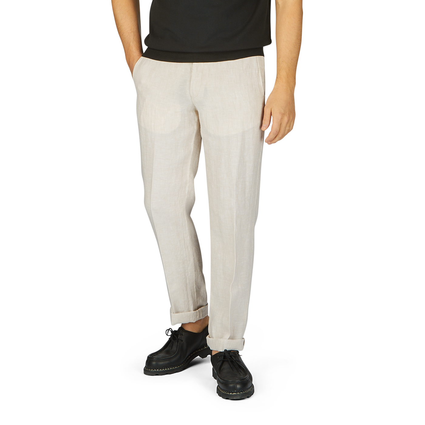 Man wearing Hiltl light beige washed linen regular fit chinos and black platform shoes, standing against a plain background.