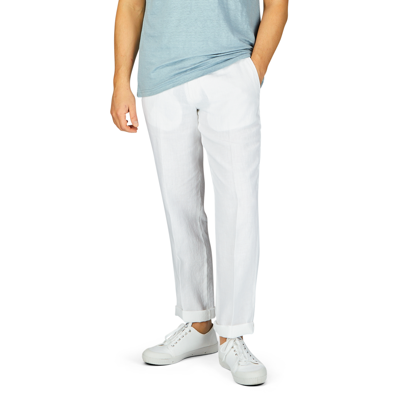 A person wearing a light blue t-shirt, Hiltl's White Washed Linen Regular Fit Chinos, and white sneakers standing against a grey background.