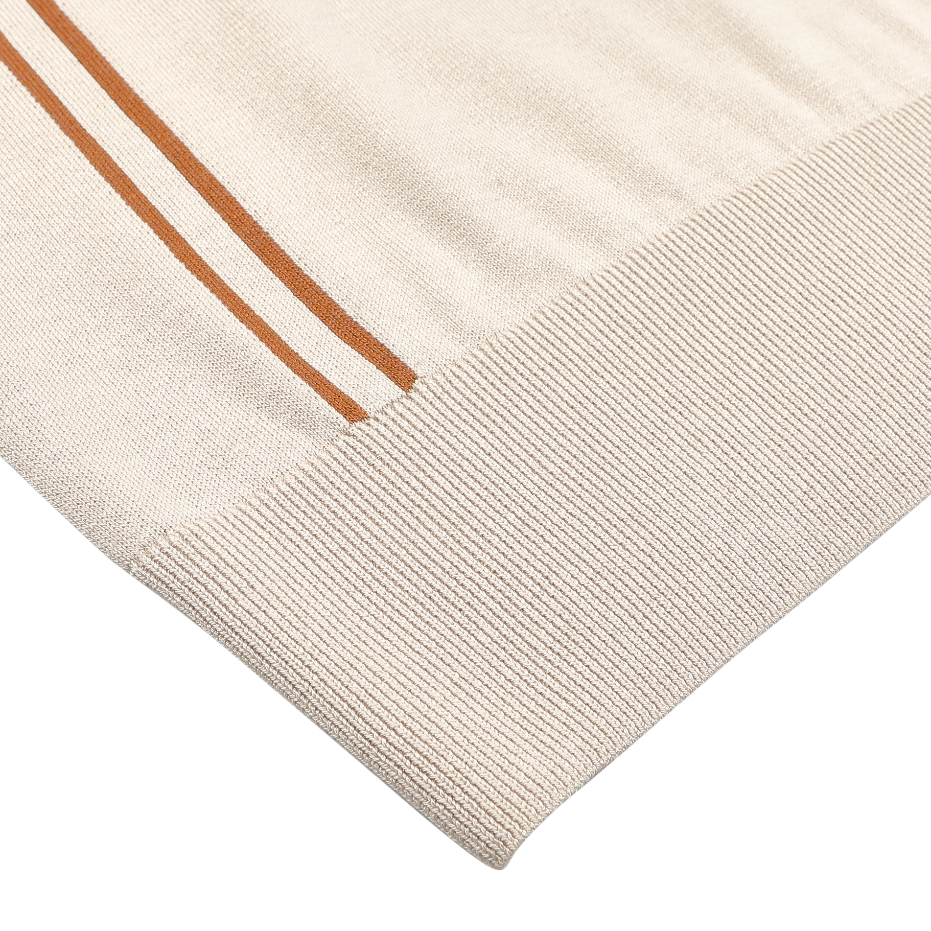 A close-up reveals the ribbed cuff of a Beige Silk Cotton Full Zip Tennis Polo Shirt by Maurizio Baldassari, crafted in an exquisite silk-cotton mix with two parallel brown stripes.