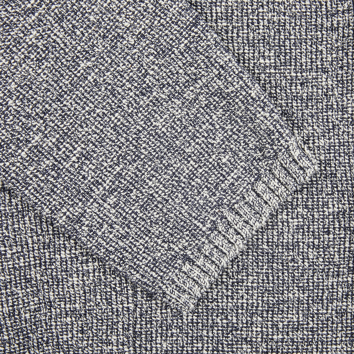 A close up image of a Maurizio Baldassari Blue Melange Cotton Mouline Knitted Jacket.