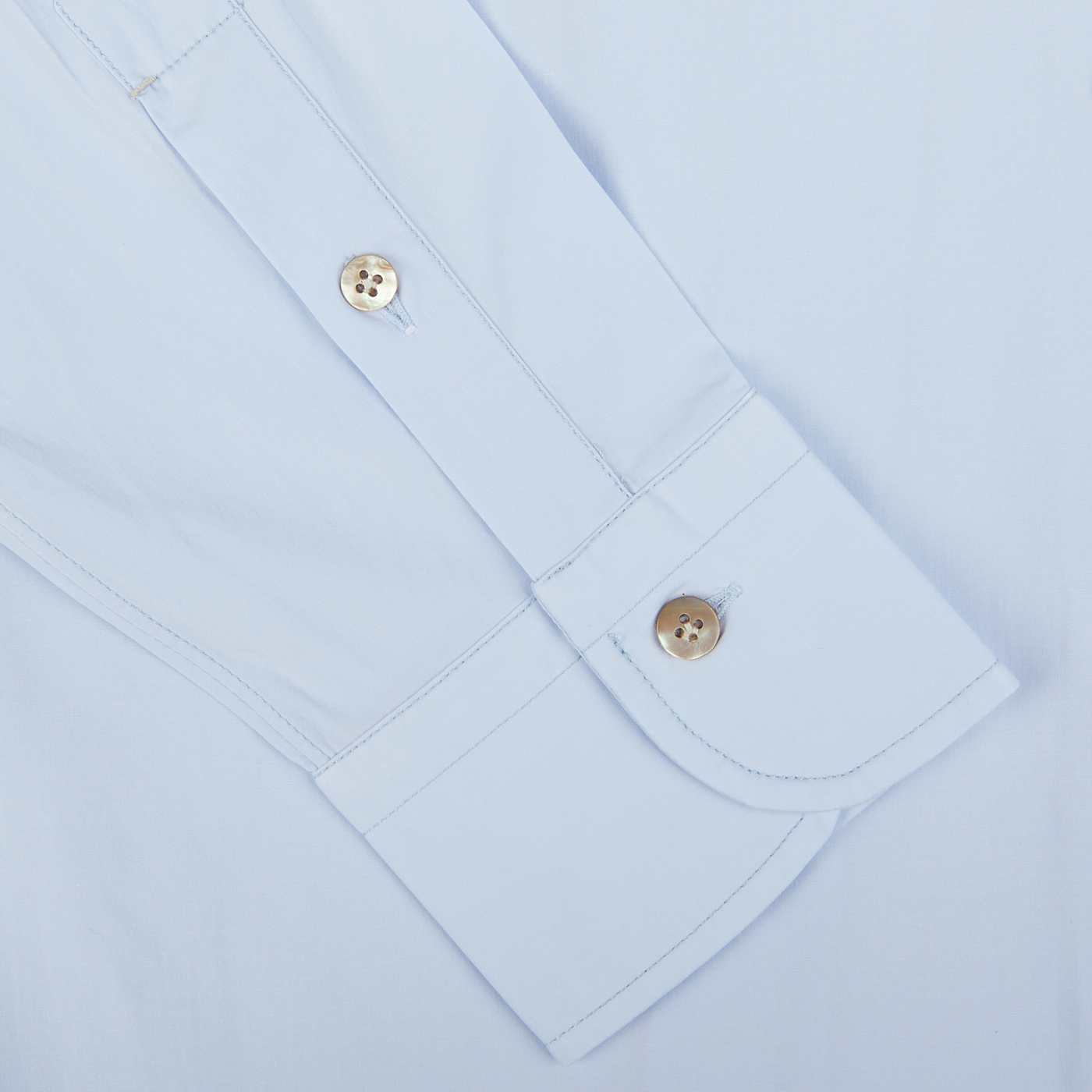 Close-up of a Mazzarelli Sky Blue Cotton Gabardine Regular Fit Shirt cuff with two buttons.