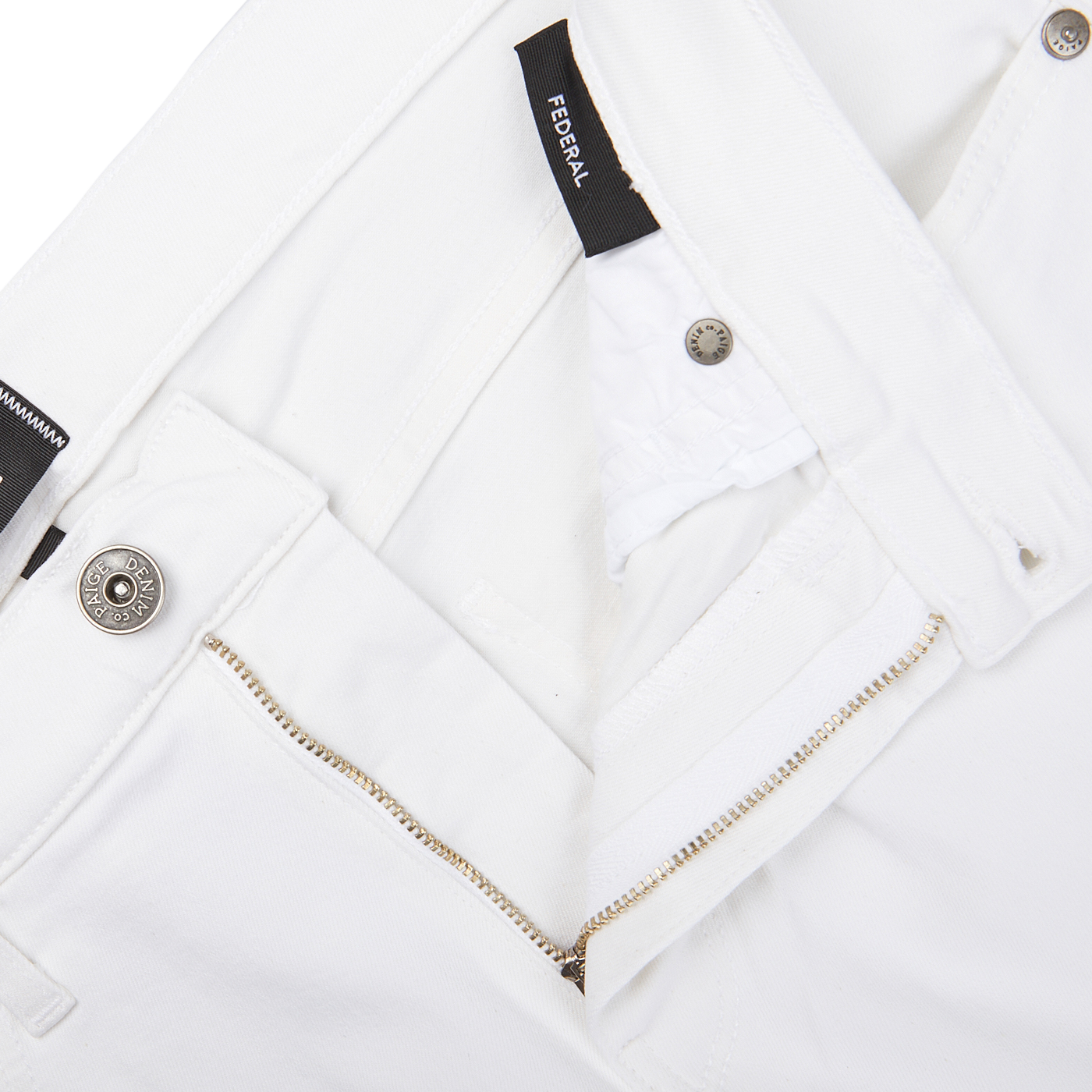 Close-up of Icecap White Cotton Transcend Federal Slim Paige jeans with zipper and button details.