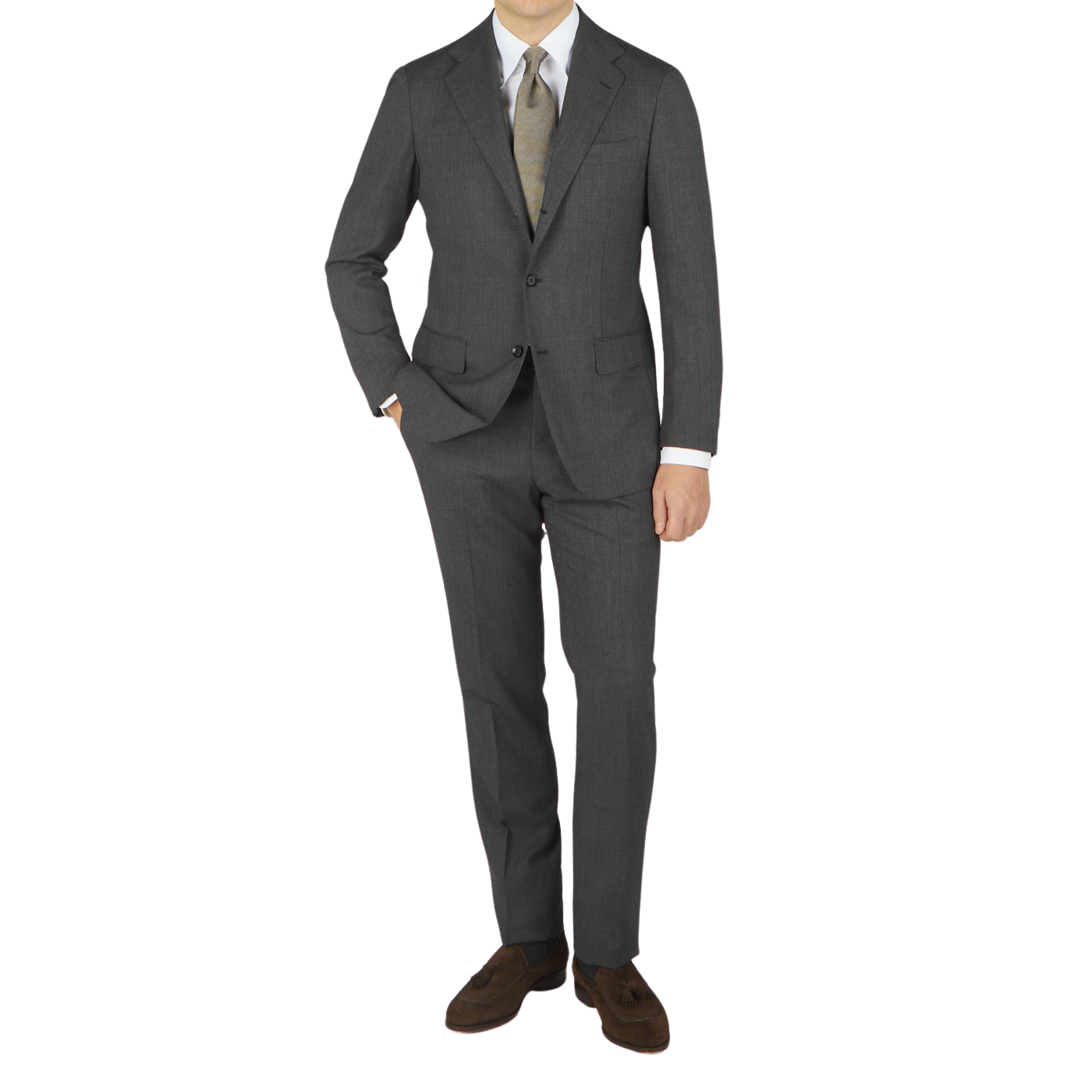 A man wearing a dark grey Ring Jacket high twist wool suit with a notched lapel, light green tie, white shirt, and brown shoes, standing against a plain background.
