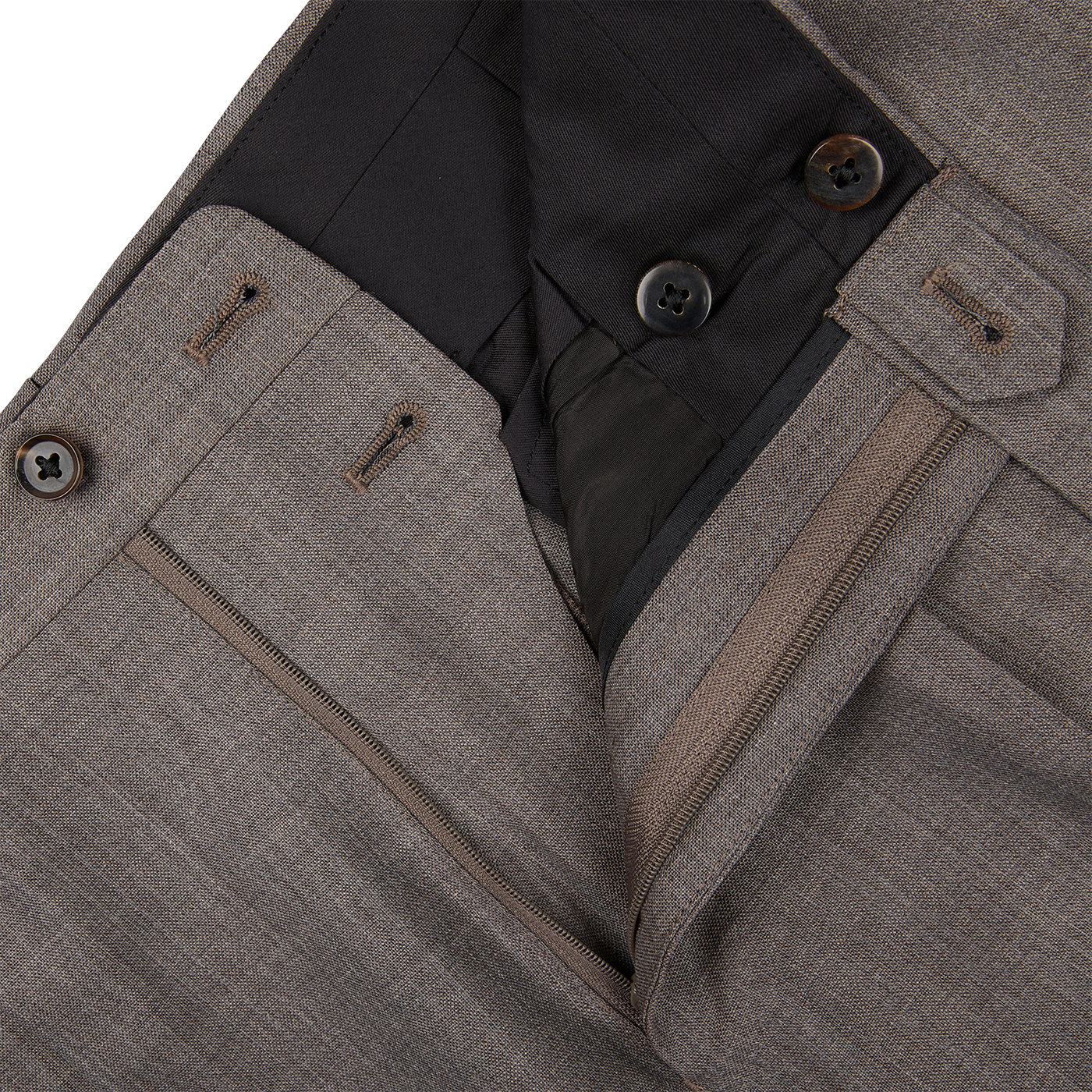 Close-up of a layered Mid Grey High-Twist Wool Suit jacket by Ring Jacket with zipper and button details.