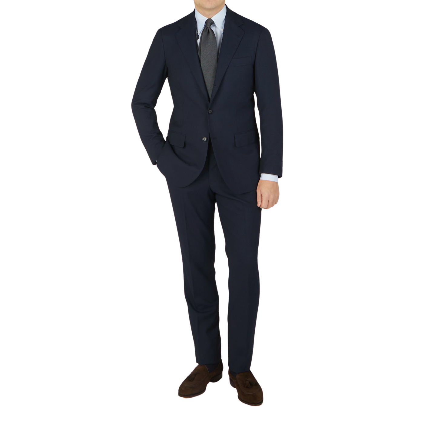 A man in a Ring Jacket Navy Blue High Twist Wool Suit, white shirt, and gray tie, standing against a light background.