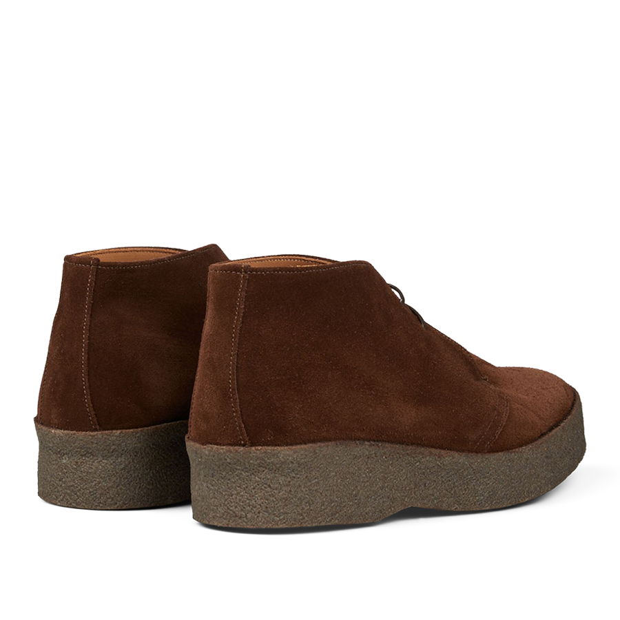 A pair of Polo Snuff Suede Hi Top Boots by Sanders with a rubber crepe sole on a transparent background.