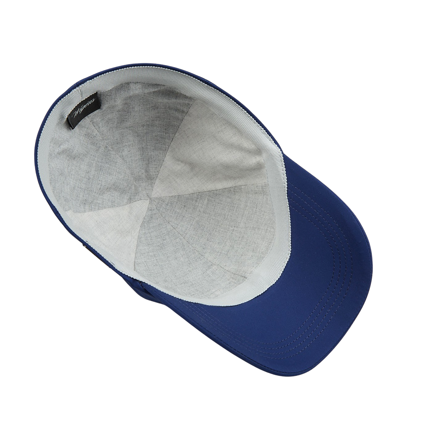 A Wigéns Mid Blue Microfibre Nylon Baseball Cap made of technical nylon microfibre on a white surface.