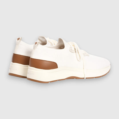 The Gran Sasso White Knitted Sneaker features an off-white knit upper, thick white soles, brown heel accents, white laces, and subtle branding on the heel and side. Shown from back and side angles on a light gray background. , available at Richard Gelding Mayfair