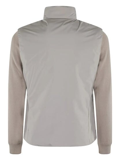 Back view of the Moorer Ivory Avorio Removable Sleeve Evan Bomber, featuring a high collar and contrasting darker beige fabric on sleeves and sides for a minimalistic look—perfect outerwear for the modern adventurer. , available at Richard Gelding Mayfair