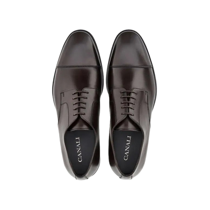 Canali’s Brown Calf Derby Shoes feature a rubber sole for all-weather grip, toe caps, and black insoles printed with the brand name in white—blending elegance and practicality with classic lace-up styling. , available at Richard Gelding Mayfair