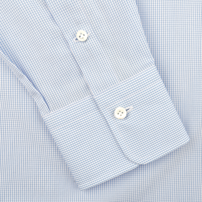 Close-up of Alessandro Gherardi's Blue Gingham Checked Cotton Single Cuff Shirt, showcasing its light blue and white pattern with two white buttons.