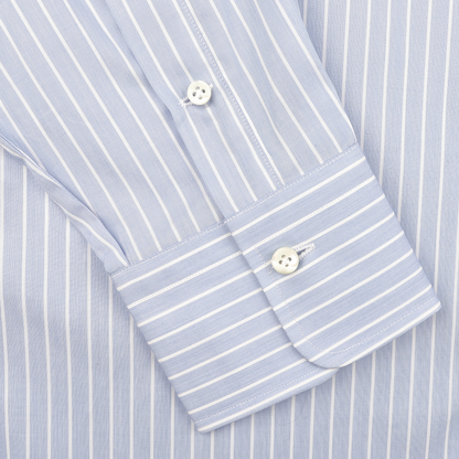 Close-up of the Alessandro Gherardi Blue Wide Striped Cotton Single Cuff Shirt sleeve, showcasing its light blue vertical stripes and buttoned cuffs design.