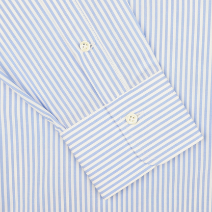 Close-up view of an Alessandro Gherardi Light Blue Striped Cotton Single Cuff Shirt sleeve, with a buttoned cuff, perfect for men's formal wear.
