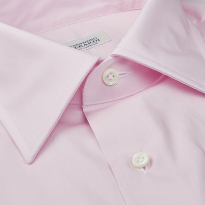 A close up of a high-quality Alessandro Gherardi Pink Fine Cotton Single Cuff Shirt with handmade buttonholes.